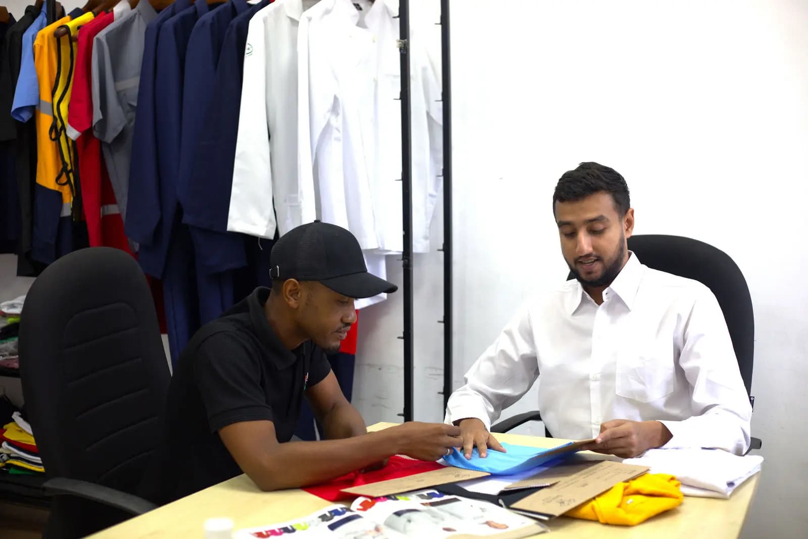 Fabric and colour options being reviewed at the sampling desk
