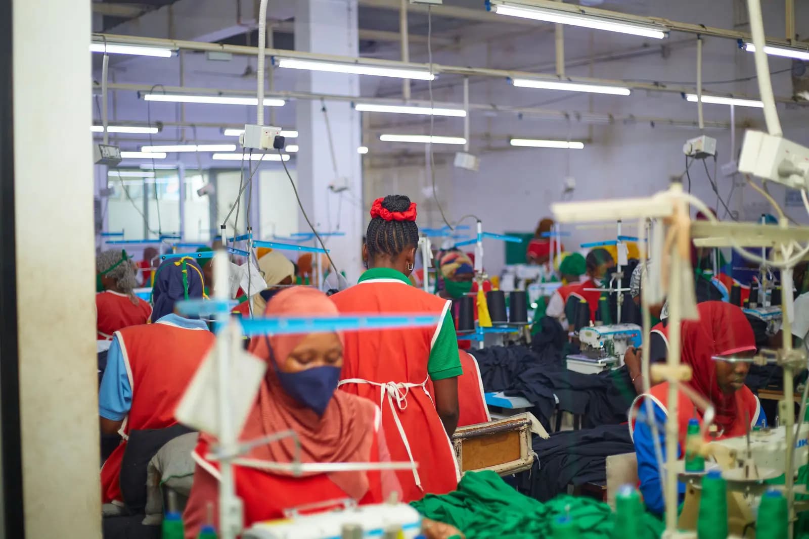 The Swahili Knits sewing floor at full production